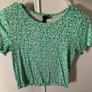 Green floral crop top with lettuce cut from wild fable